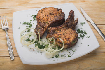 grilled meat ribs on wood table