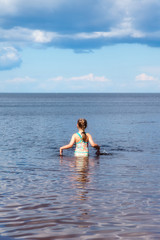 Girl swimming in the lake