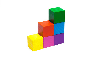 Obraz premium colored children cubes on white isolated background