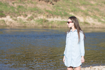 woman walking on rocks