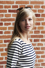 Portrait of beautiful woman in striped top