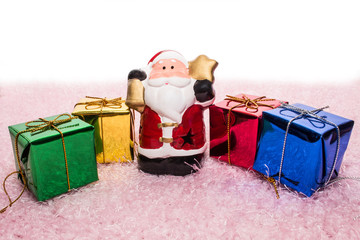 Santa Claus doll and gift box for christmas.