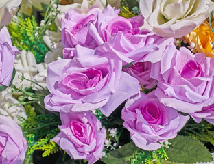 vibrant pink fake rose flowers closeup