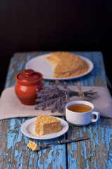 Honey cake on a wooden background