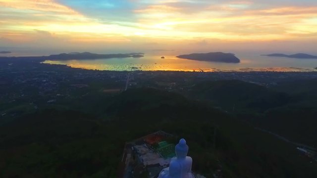 sunrise in Andaman sea in front of Phuket's big Buddha