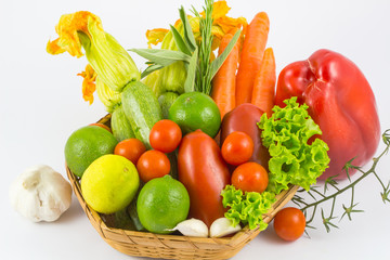 Fototapeta na wymiar Fresh vegetables in basket on white background / Mix Fresh vegetables in the kitchen / fresh vegetables.