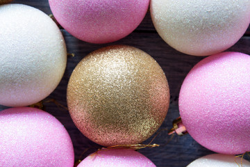 Varicoloured Christmas tree toys on the blue wooden background. Christmas and New Year background.