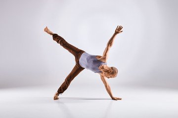 Man doing yoga isolated on white background