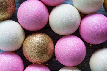 Varicoloured Christmas tree toys on the blue wooden background. Christmas and New Year background.