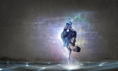 Fototapeta premium B-boy performing some moves . Mixed media