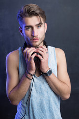 Portrait of young fashion man with headphones