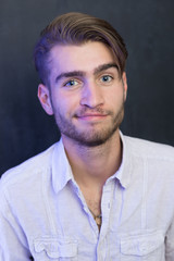 Portrait of a bearded man light  by fluorescent light. Bearded m