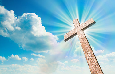 Wood cross on blue sky