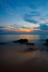 Fototapeta na wymiar Colorful sunrise at Desaru Beach