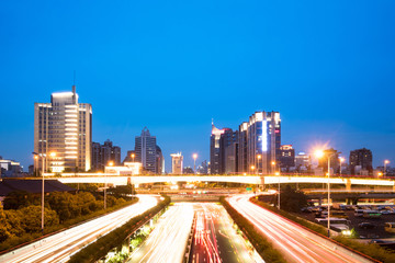 Obraz na płótnie Canvas busy traffic on road in chongqing new city at night