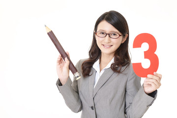 数字を持つ女性教師