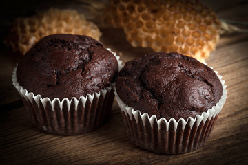 Chocolate muffin on dark background.