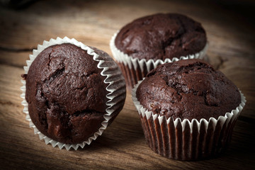 Chocolate muffin on dark background.