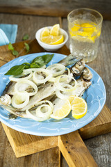 Fish, cooked with milk, onion and pepper