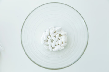 Assorted pharmaceutical medicine pills, tablets and capsules on