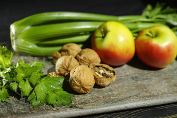 Ingredients for Waldorf salad -  celery, apples, walnuts