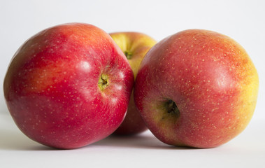 Several autumn red apples