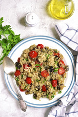 Quinoa with eggplants and grilled tomatoes.Top view.
