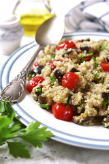 Quinoa with eggplants and grilled tomatoes.