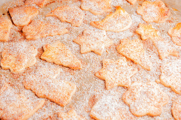 Closeup of different cookies on the baking sheet