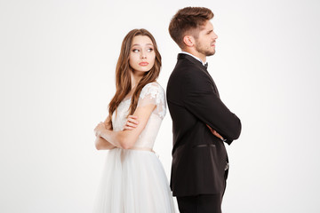 Irritated couple ignoring each other