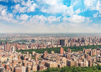 Fototapeta na wymiar Helicopter view of Central Park and city skyscrapers in Manhatta
