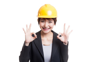 Asian engineer woman show OK with both hands.