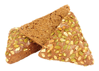 Pumpkin seed covered pumpernickel bread triangles