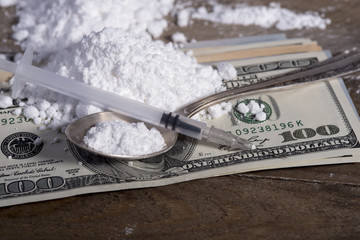 Drug syringe and cooked heroin