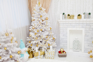 Snow-covered trees in the Christmas festive interior