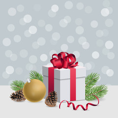 Christmas gift box with red ribbon and decoration ball on silver