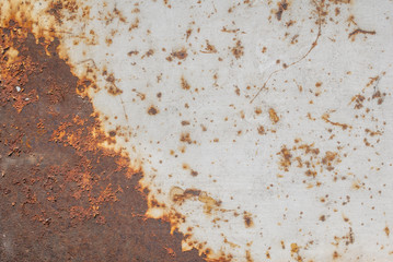 surface of rusty iron with remnants of old paint, grunge metal surface, great background or texture for your project