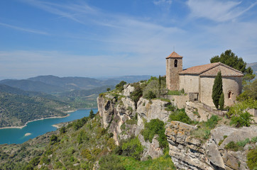 Obraz premium Ancient village Siurana on the green steep slope