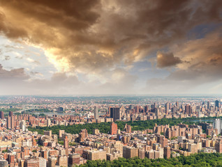 Fototapeta premium Helicopter view of Central Park and city skyscrapers in Manhatta