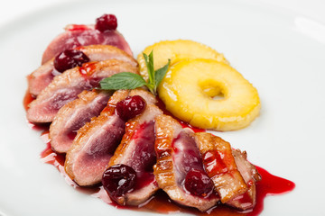 grilled duck meat with cherry sauce