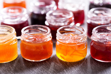 various jars of fruit jam