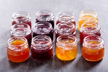 Fototapeta na wymiar various jars of fruit jam