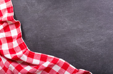 checkered tablecloth on dark background