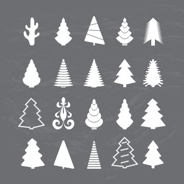 Set of white silhouettes Christmas tree on the chalkboard. Vector illustration.