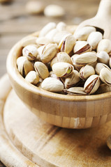 Salth pistachios on the wooden table