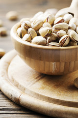 Salth pistachios on the wooden table