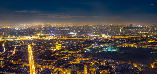 Aerial view of Paris, France at night.