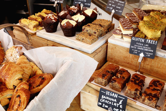 Independent coffee shop with display of vegan and gluten-free cakes