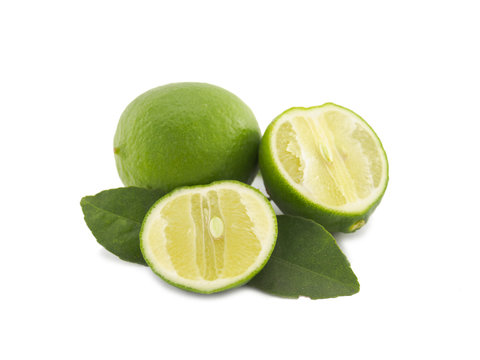 Fresh lime fruit and slice on white background