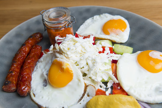 Traditional breakfast - fried eggs,sausages,salad